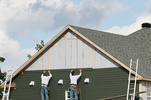 Professional Siding technician working in Bloomington, MN